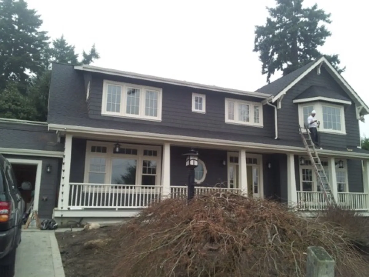 Exterior painting — dark colonial with white trim