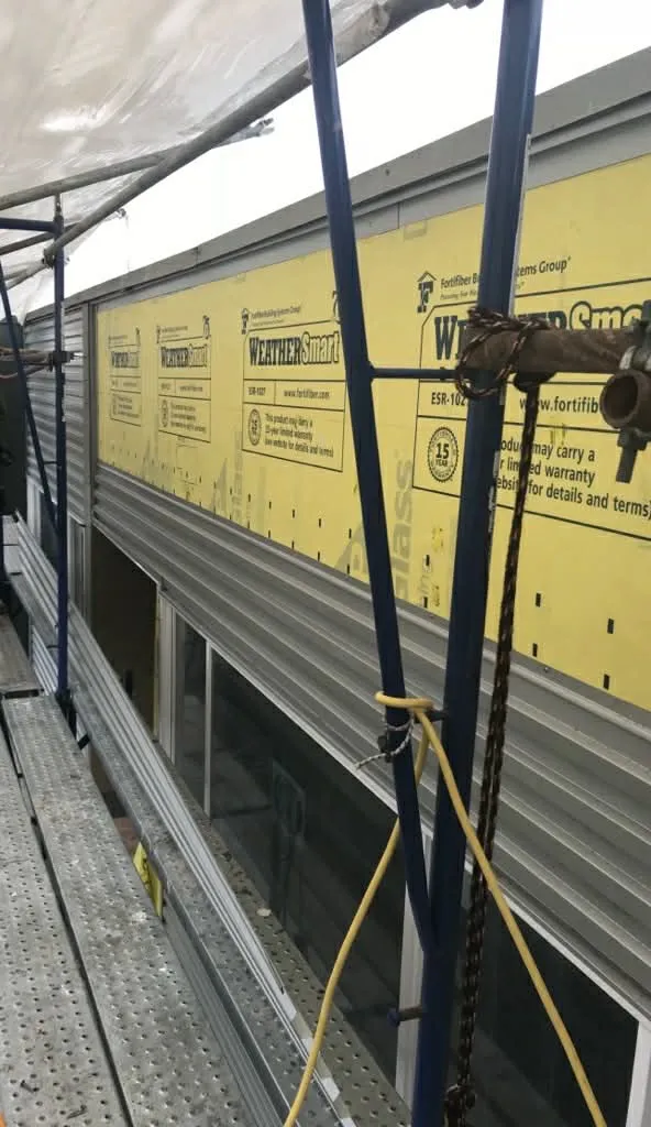 Multi-Story Panel Siding — Commercial